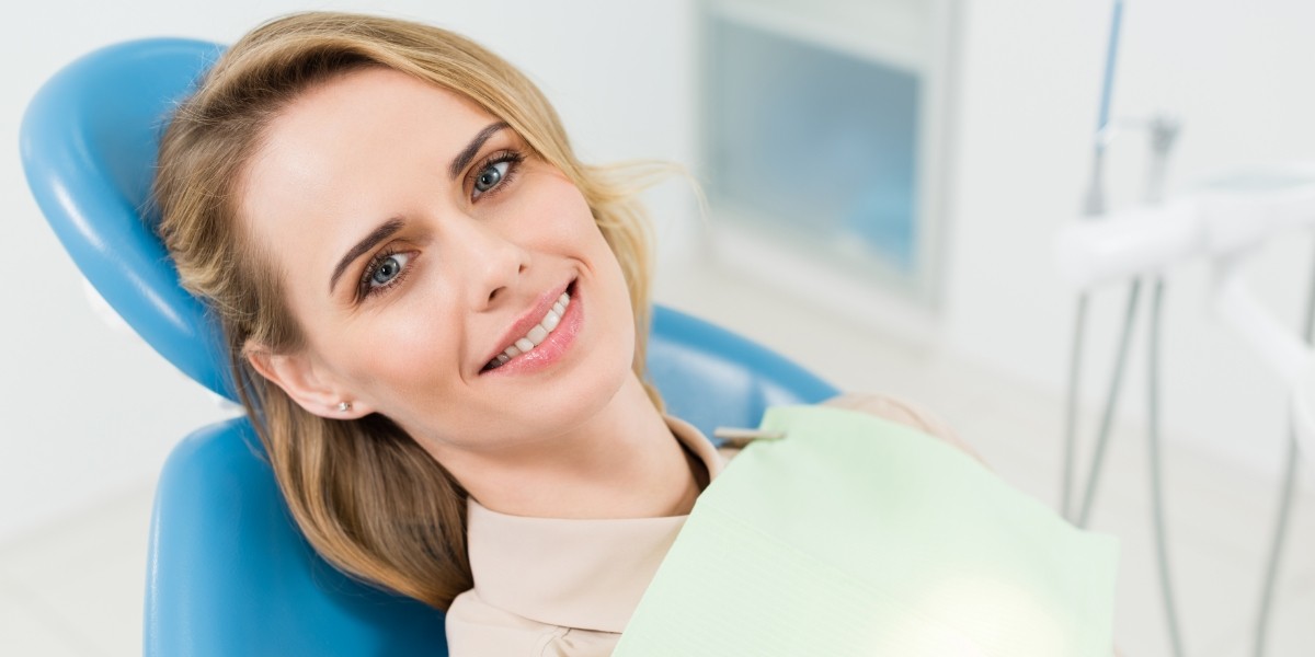 smiling female on dental chair
